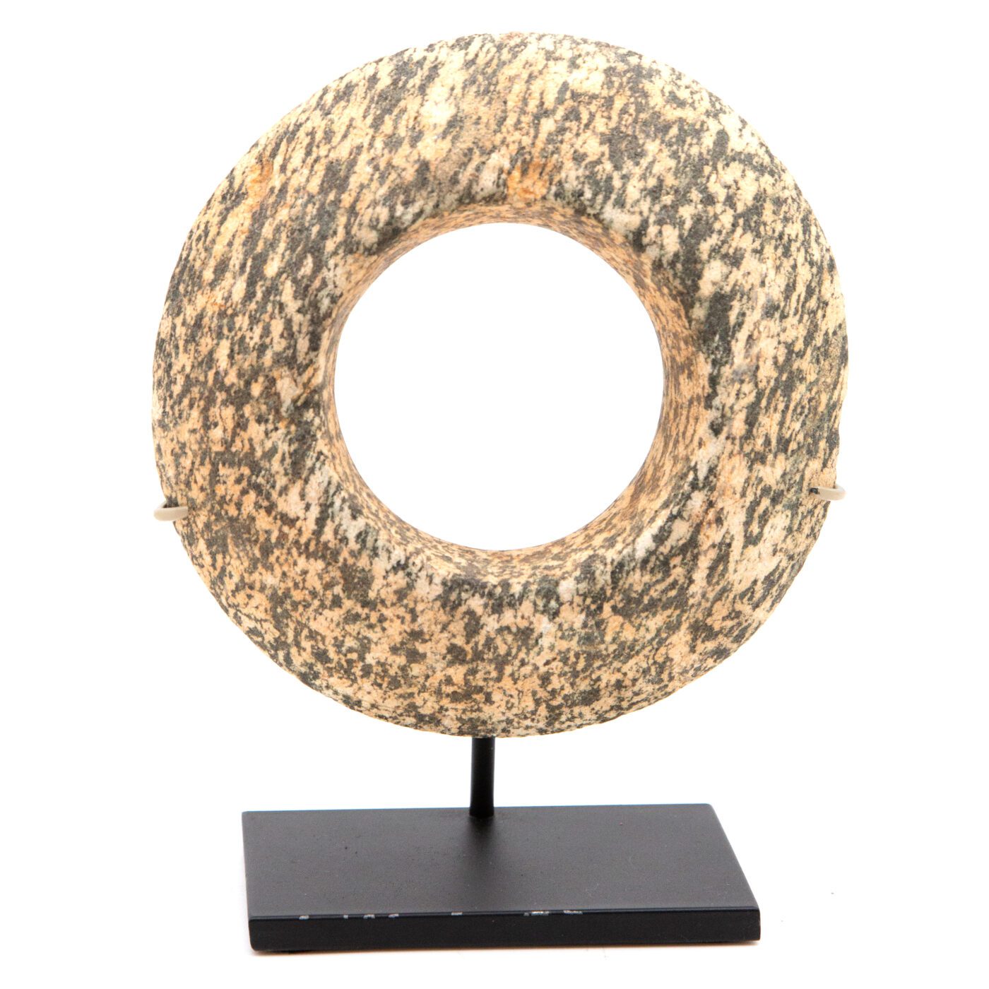 Large African Stone Bracelet mounted on a black metal stand