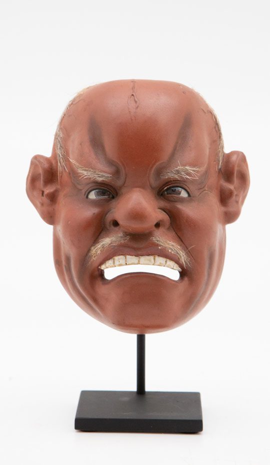 Medium Japanese Papier-Mâché Mask of an angry man Mounted on Custom Painted Metal Base