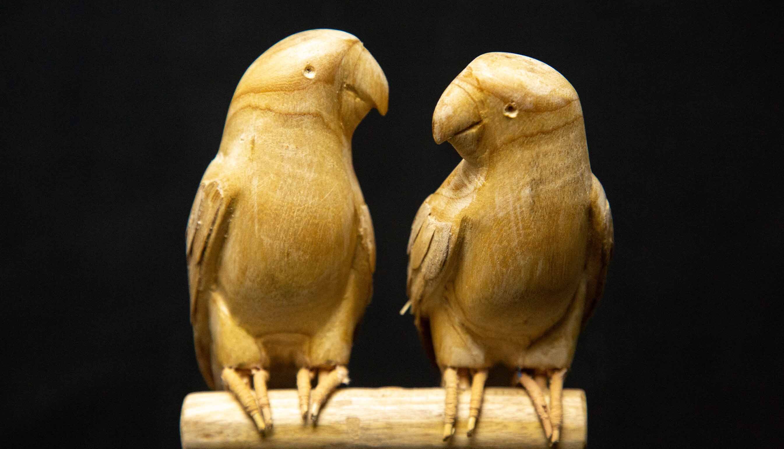 Carved Wooden Birds on a Stand