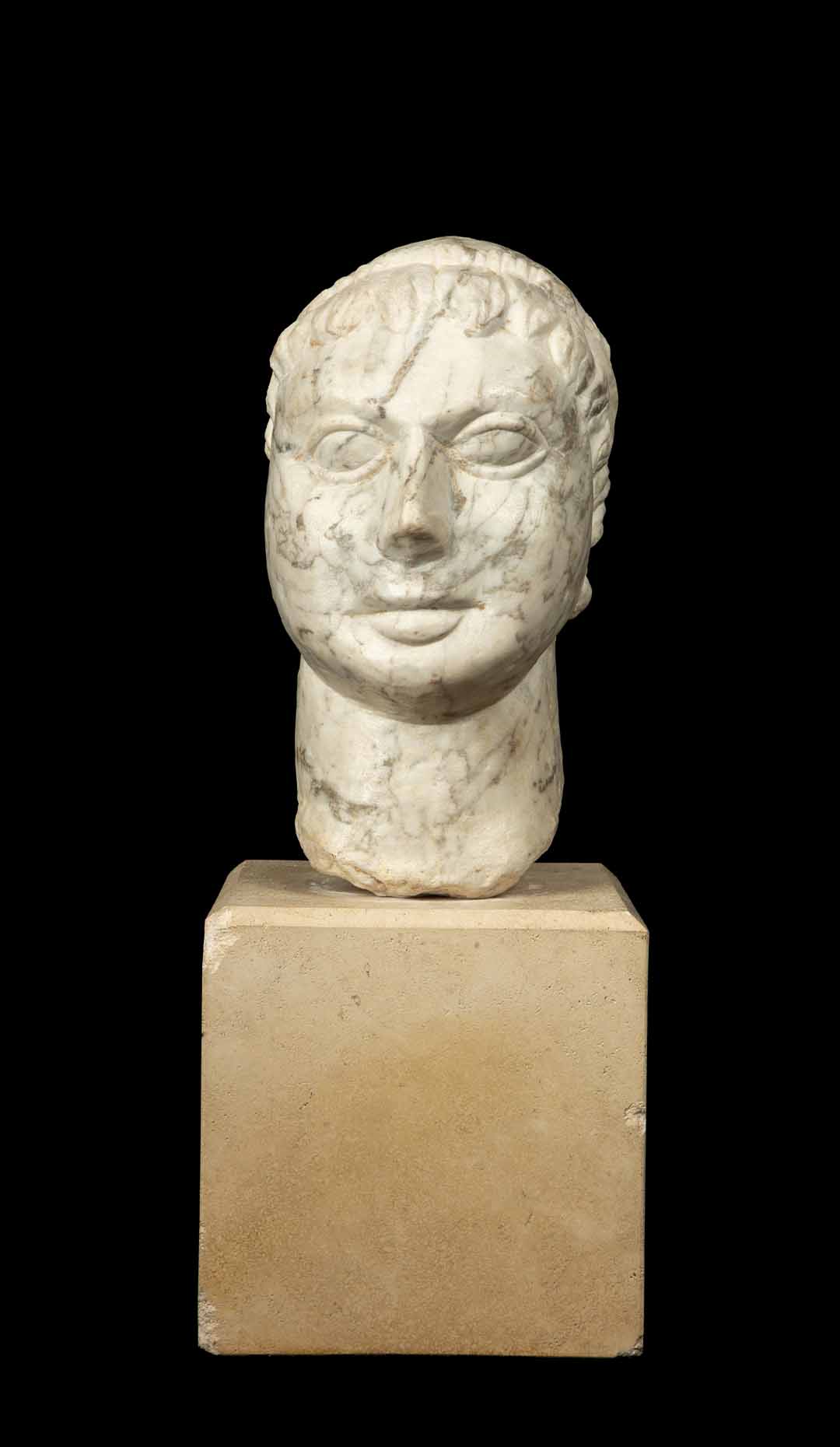 19th C. Carved Head of a man in the antique style, wearing a crown of laurels