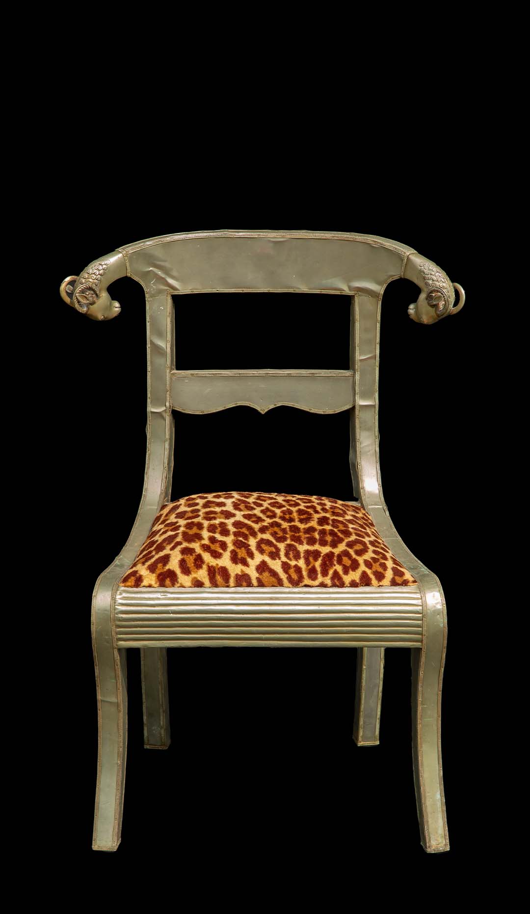 Anglo-Indian Dowry Chair: Regal Silvered Elegance with Ram’s Heads and Leopard Seat