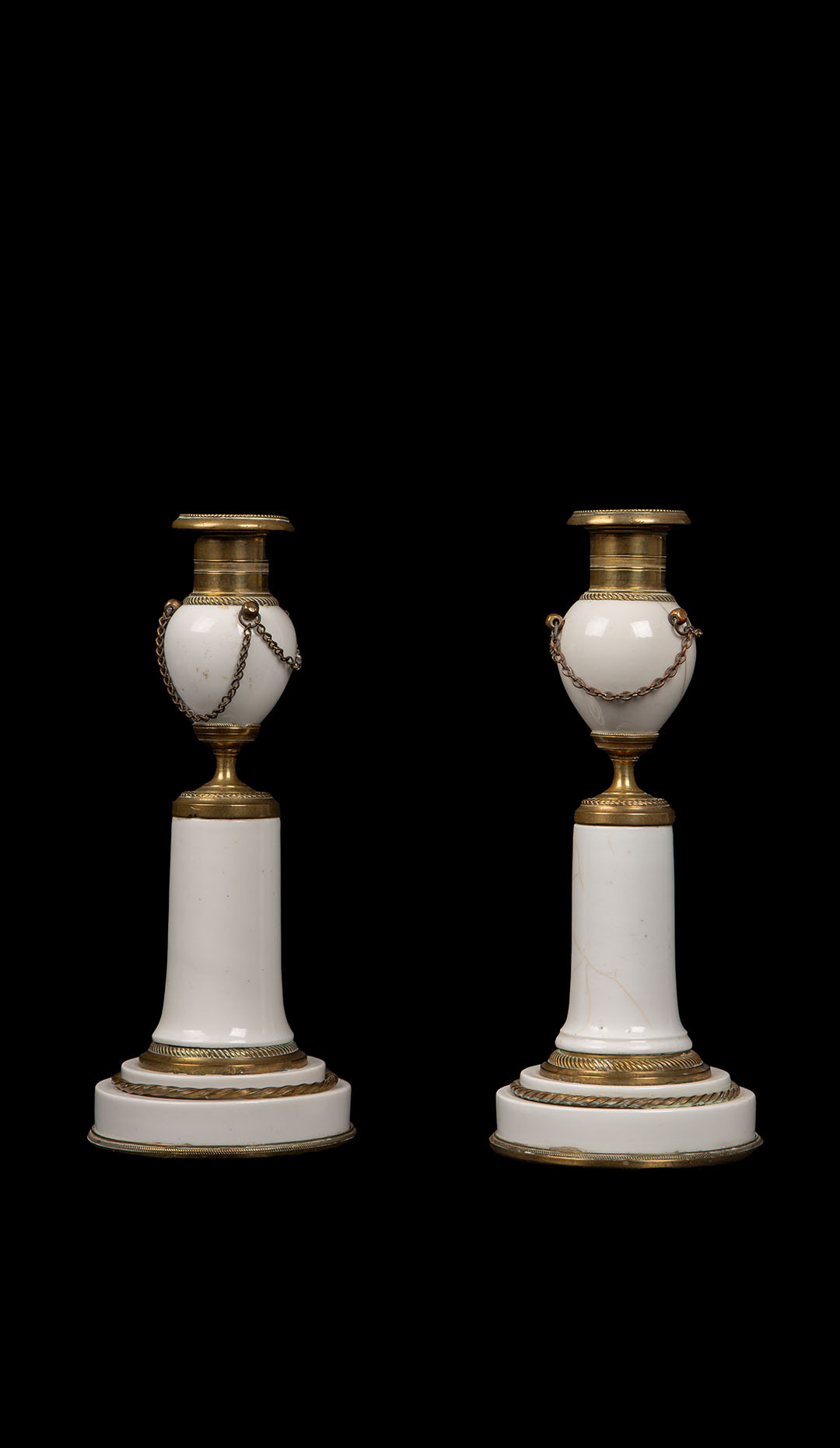 Pair of White Porcelain Candlesticks, From Late Louis XVI Period