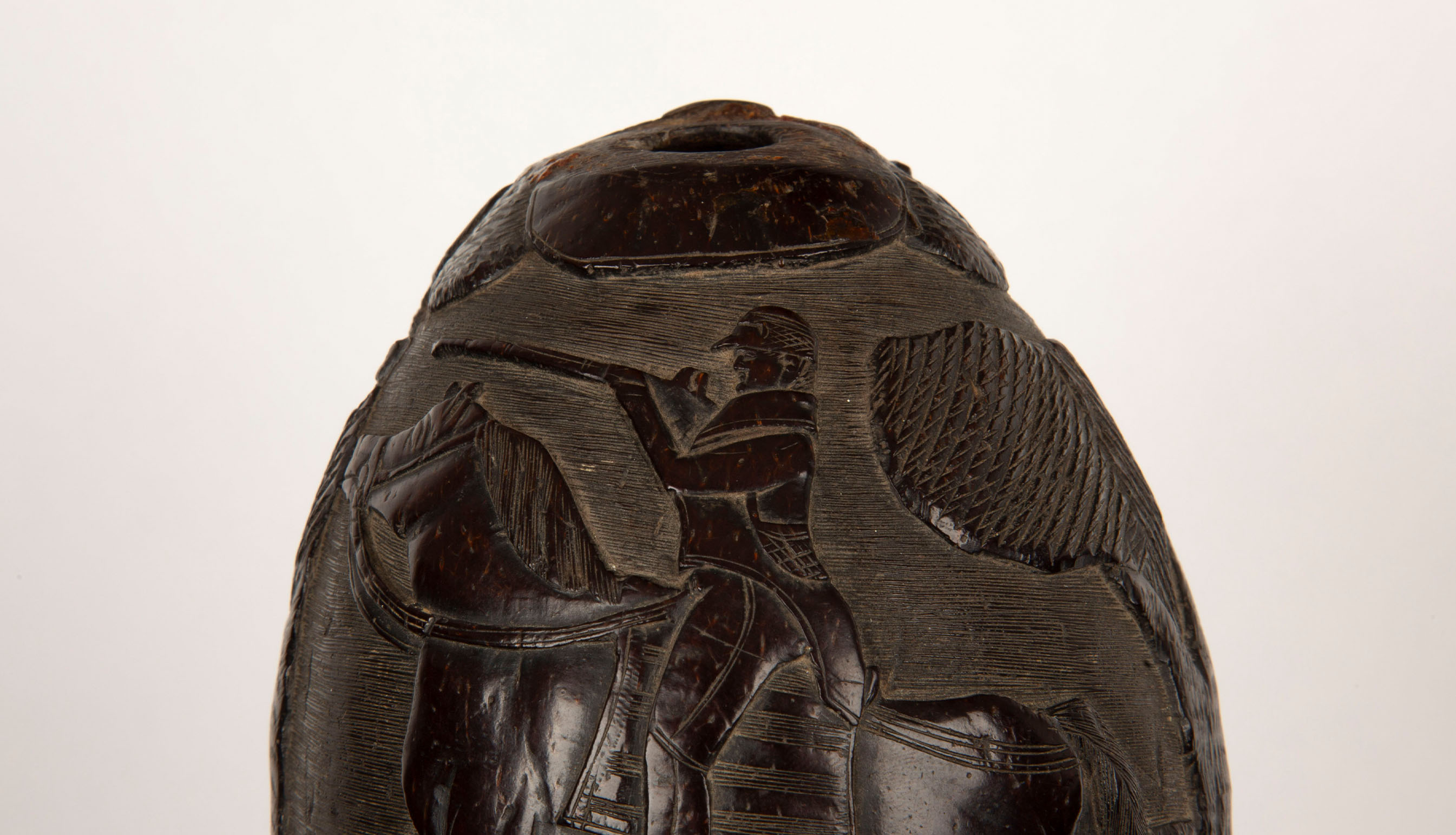 Hunting Tales: Rare 19th-Century French Colonial Carved Coconut Bugbear Flask