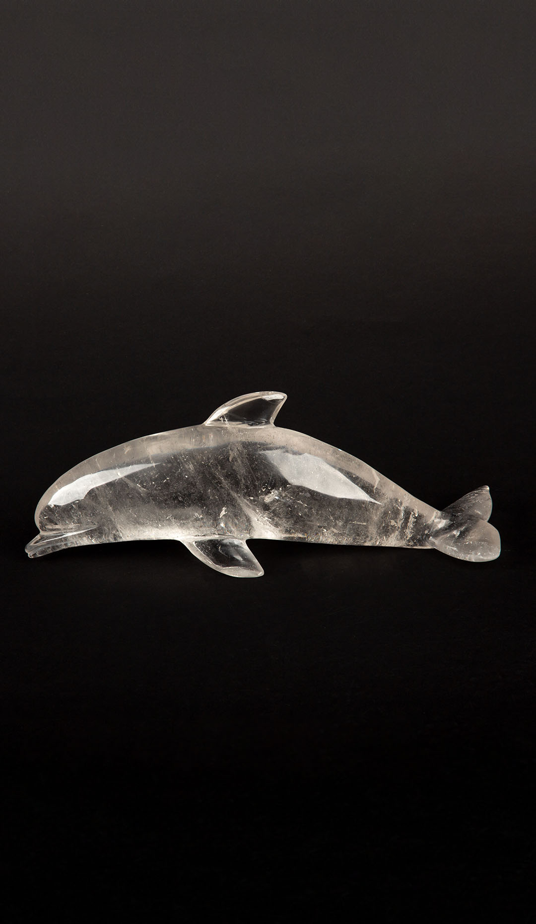 Ocean Elegance: Hand-Carved Rock Crystal Dolphin