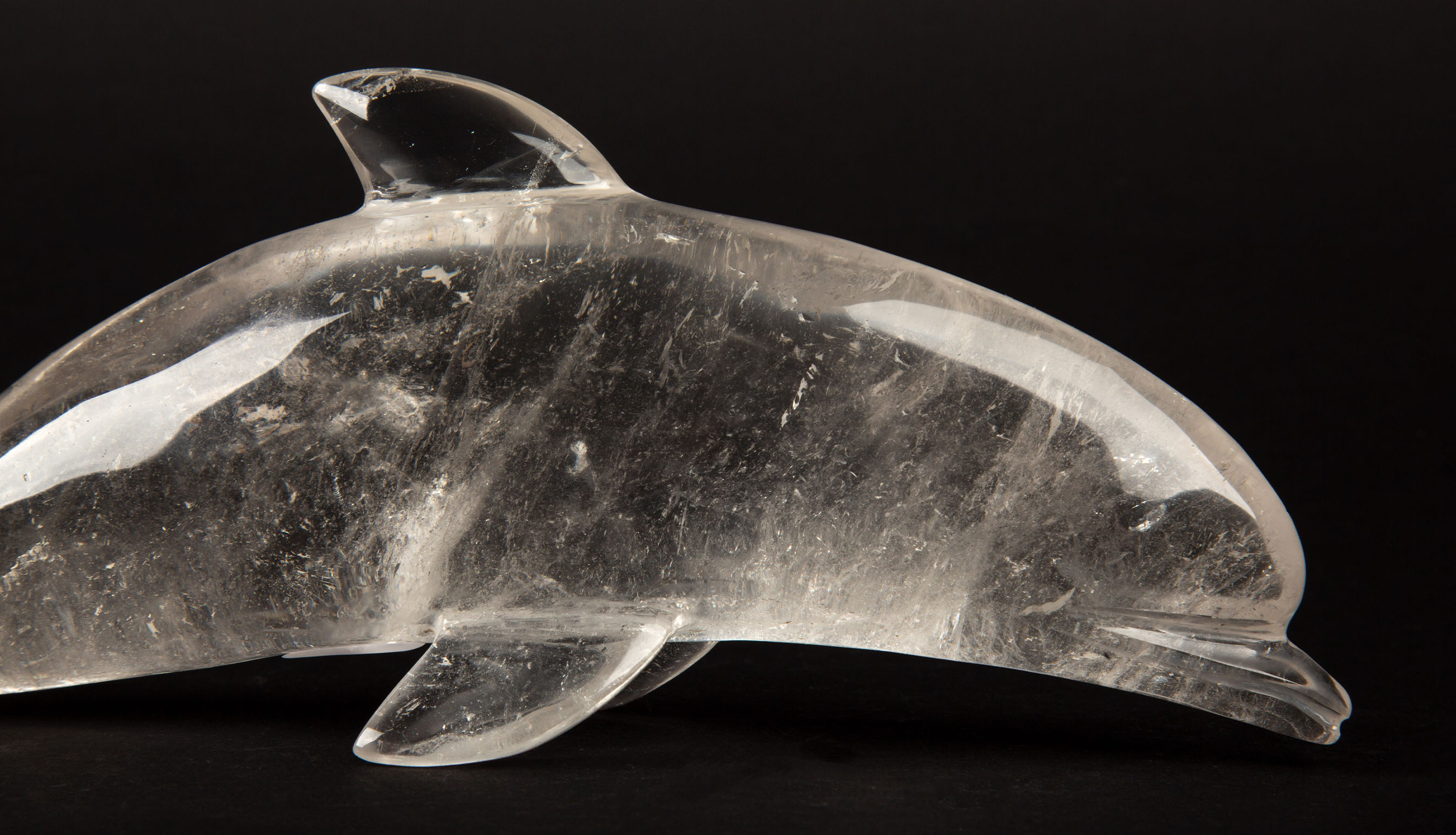Ocean Elegance: Hand-Carved Rock Crystal Dolphin