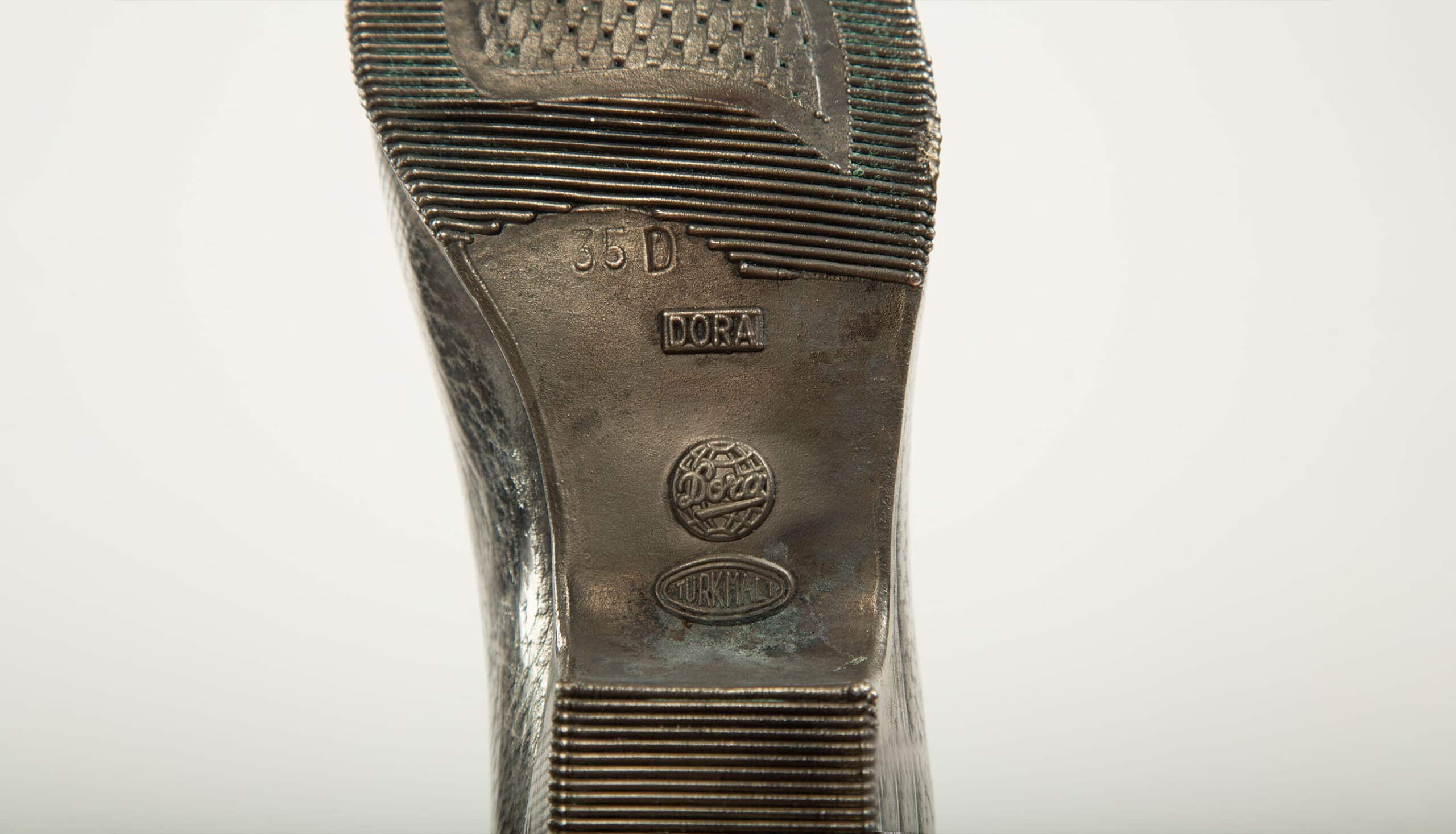 The Silver Boot – Mid-20th Century Sculpture, Signed Dora Turkmall