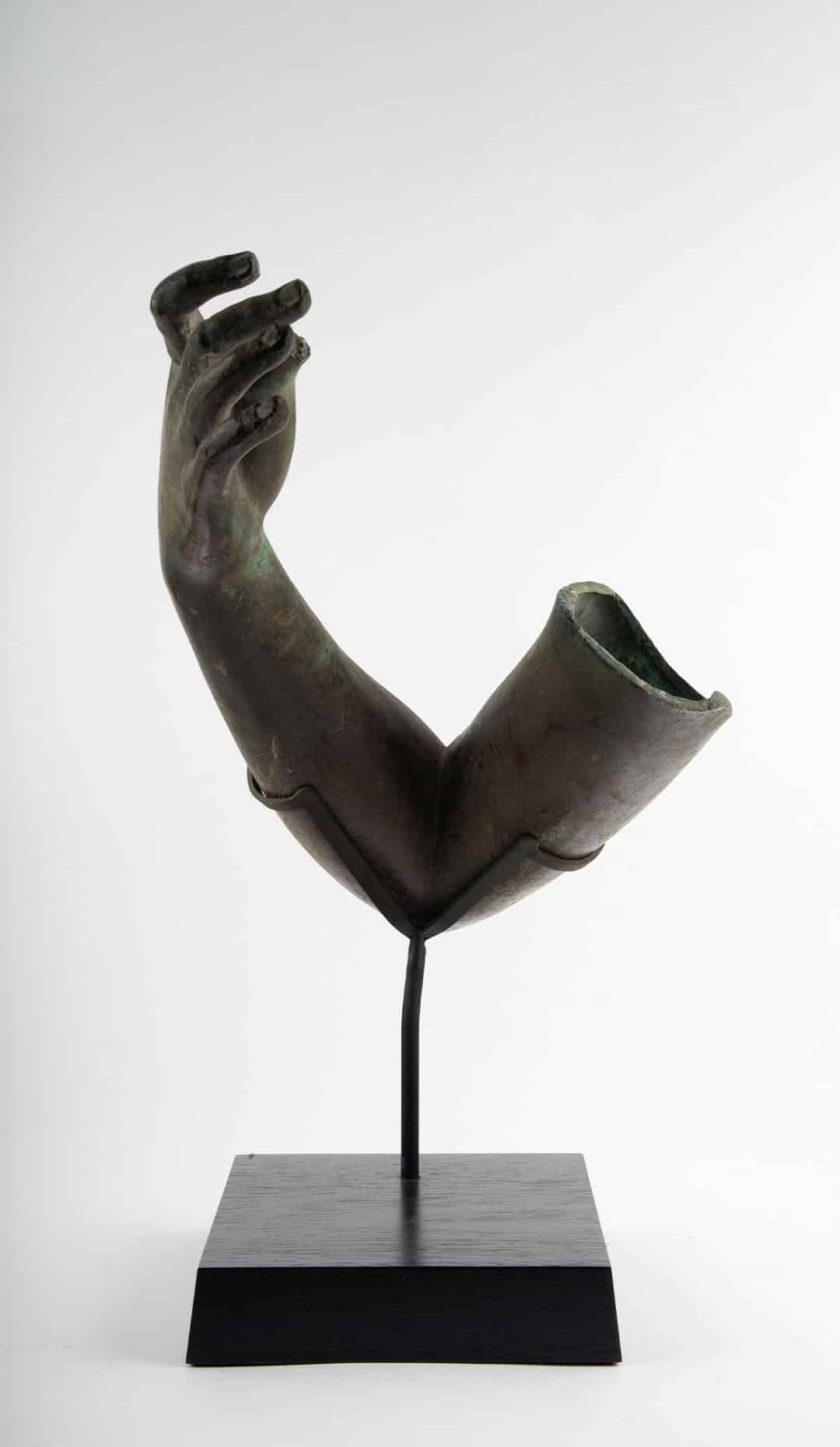 Fragment of a Bronze Arm: Mounted Green-Patinated Bronze Sculpture