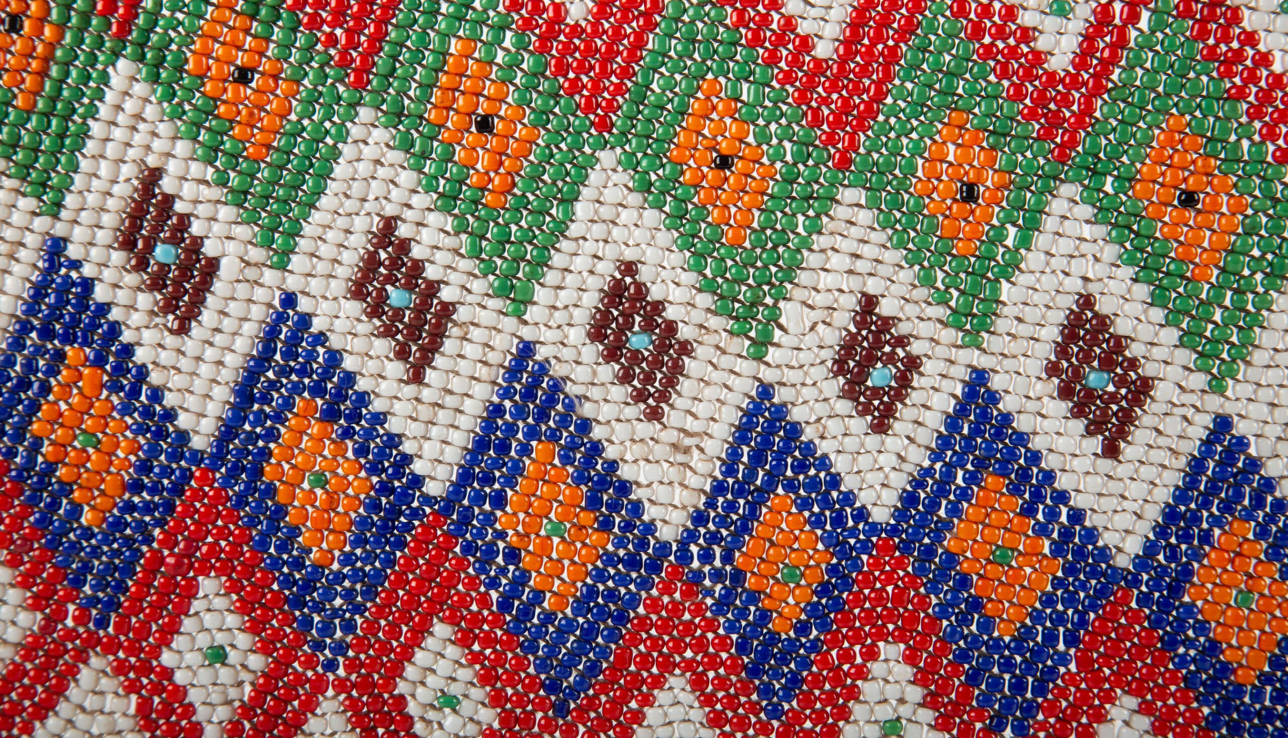 Rhythms of Color: Mounted Beaded Belt with Geometric Motifs and Cowrie Shells