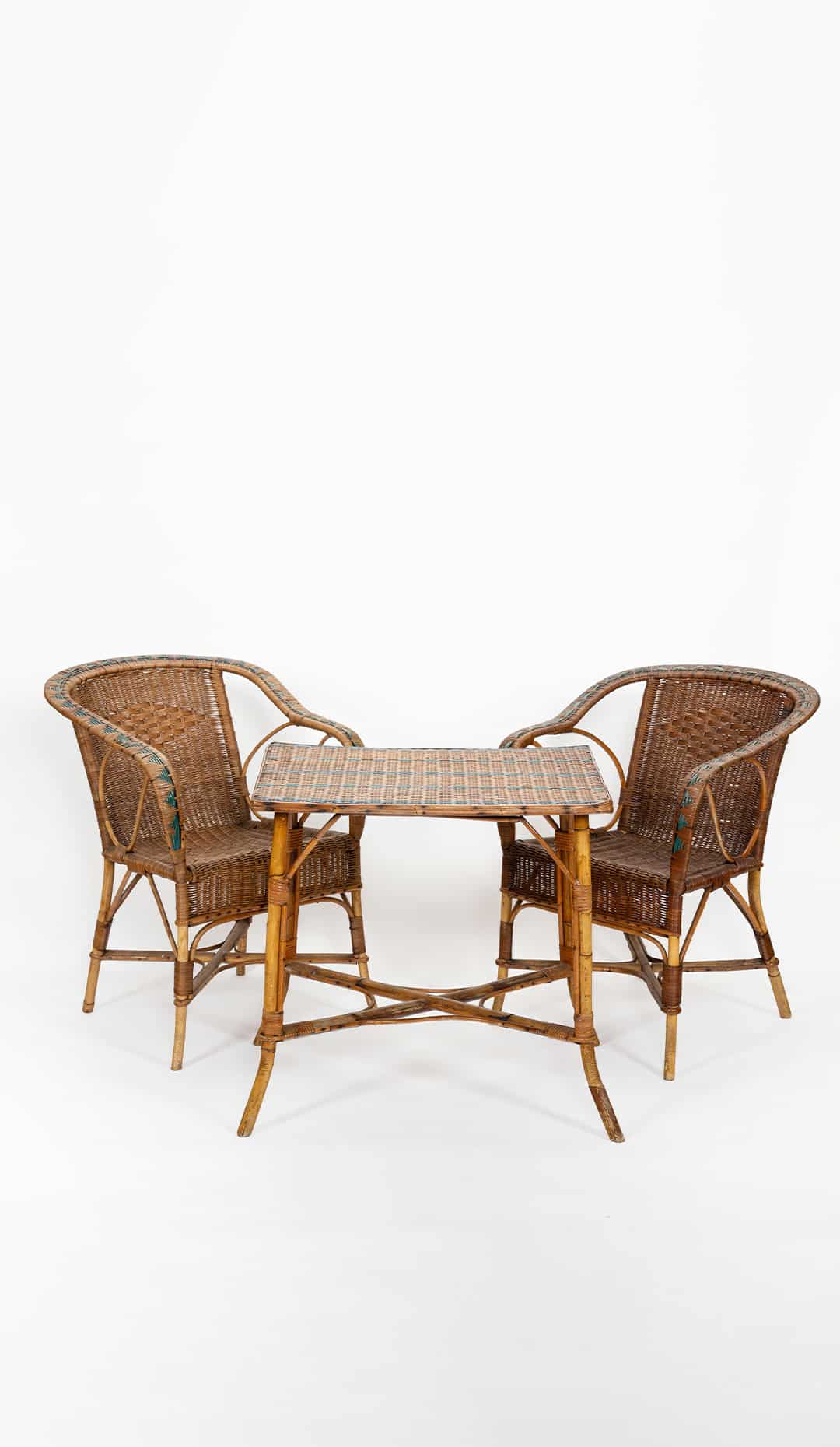 A Garden Salon in Rattan: Mid-Century French Rattan Armchairs with Side Table